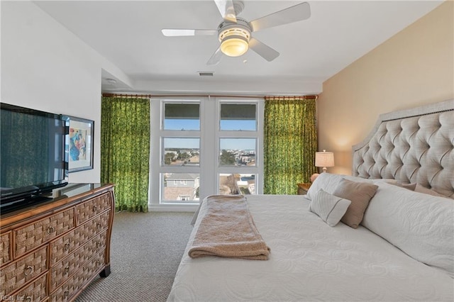 carpeted bedroom with ceiling fan