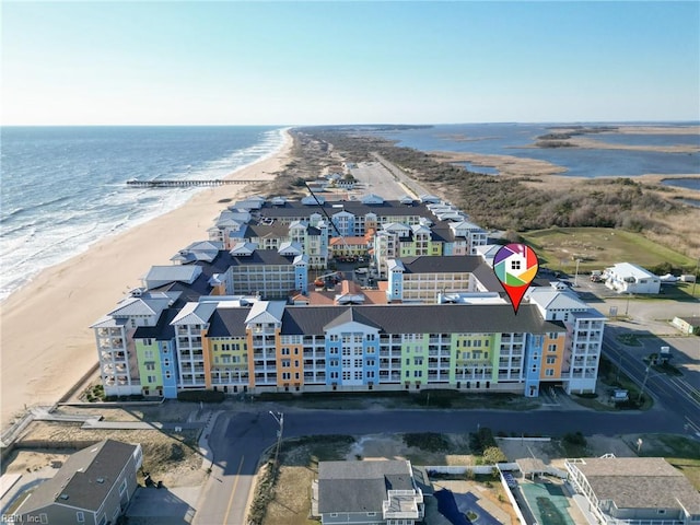 aerial view with a view of the beach and a water view