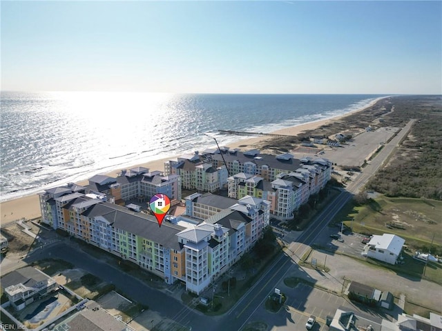 aerial view featuring a water view and a beach view