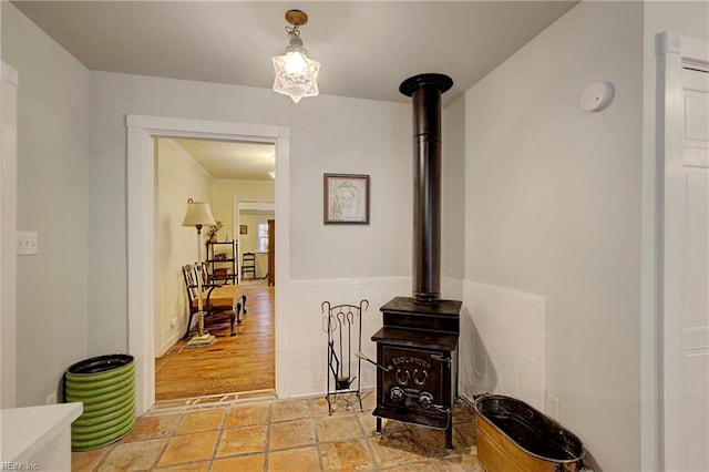 hallway featuring light tile floors