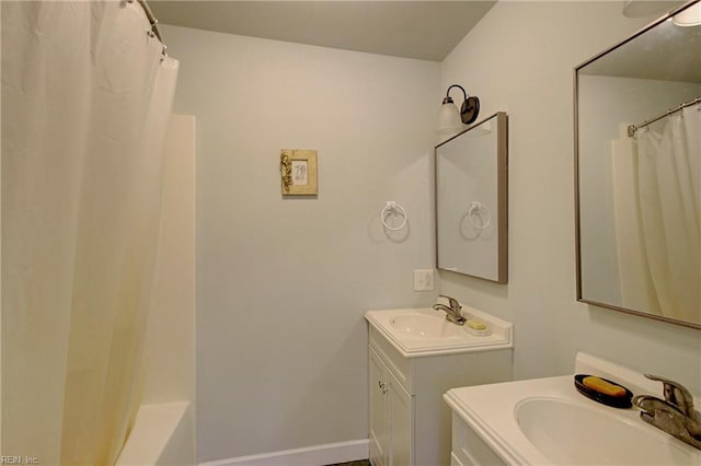 bathroom with oversized vanity and shower / bathtub combination with curtain