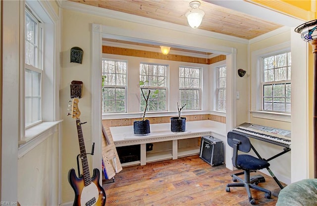 office area with hardwood / wood-style flooring, ornamental molding, wood ceiling, and a wealth of natural light