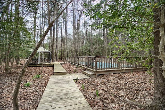 exterior space with a gazebo and a deck