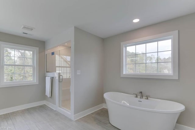 315 Dare Rd, Yorktown, VA 23692 - bathroom with a wealth of natural light and independent shower and bath