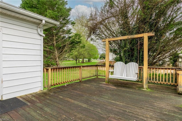 deck featuring a lawn