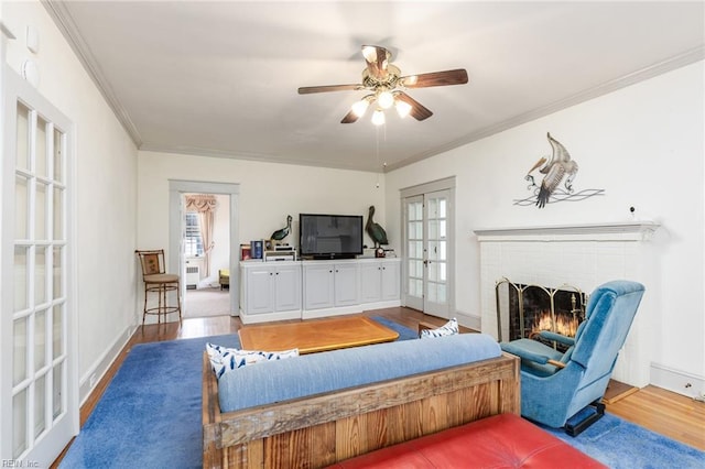 interior space with hardwood / wood-style flooring, ceiling fan, french doors, and a wealth of natural light