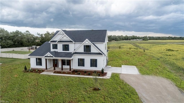 view of front of home with a front yard