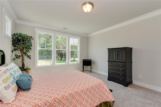 carpeted bedroom featuring ornamental molding