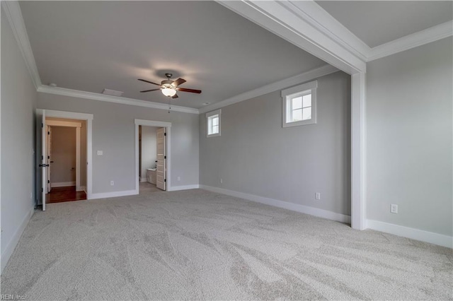 unfurnished room with ceiling fan, ornamental molding, and light carpet