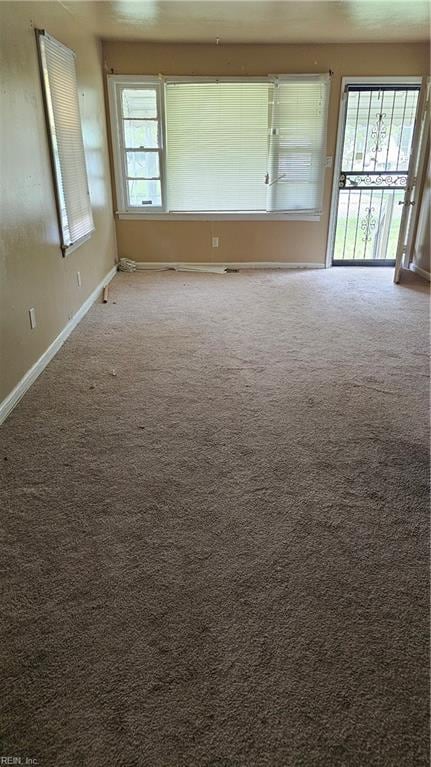 view of carpeted spare room