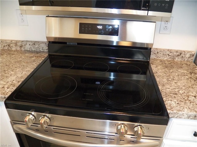 interior details with electric stove