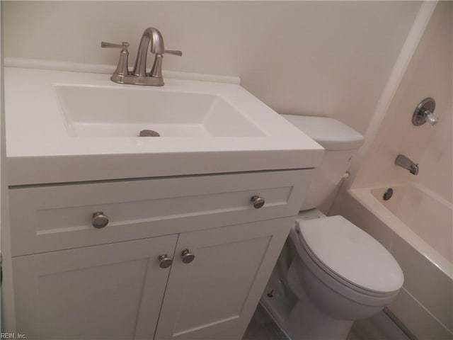 full bathroom with shower / bath combination, vanity, and toilet