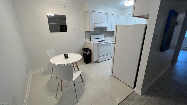 kitchen with backsplash, white cabinets, white appliances, and light tile floors