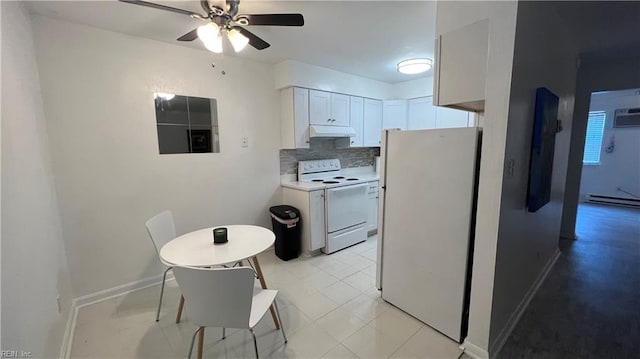 kitchen with ceiling fan, white appliances, backsplash, light tile floors, and white cabinets