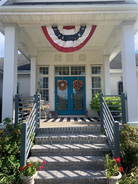 doorway to property featuring french doors and a porch