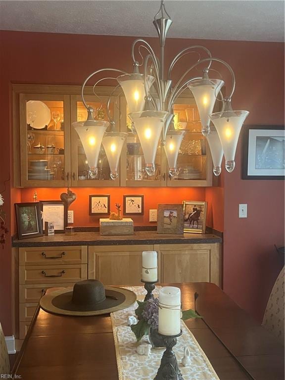 dining area featuring a textured ceiling