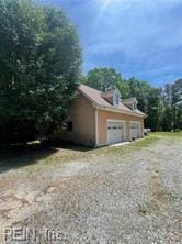 view of home's exterior featuring a garage