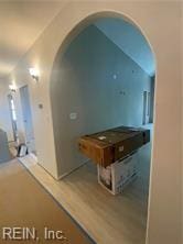 hallway featuring hardwood / wood-style floors