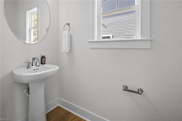 bathroom featuring hardwood / wood-style flooring and sink