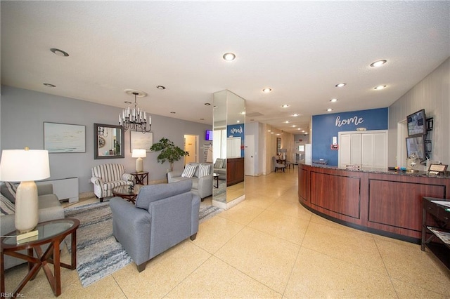 reception area featuring an inviting chandelier