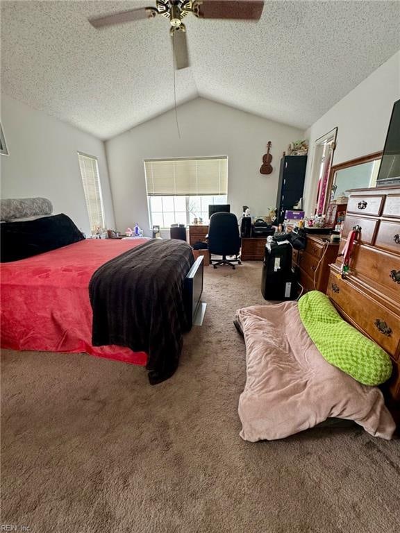 carpeted bedroom featuring ceiling fan, a textured ceiling, and vaulted ceiling