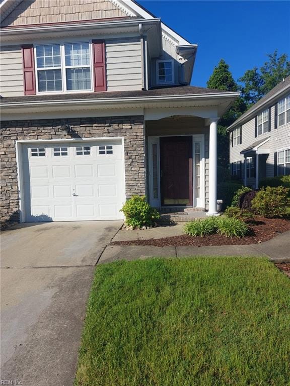 view of front of home with a garage