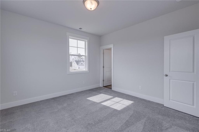 view of carpeted spare room