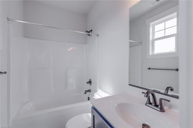 full bathroom featuring vanity, toilet, and shower / bathtub combination