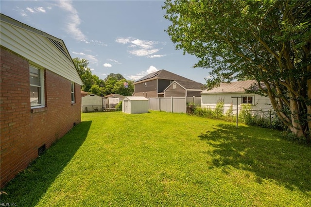 view of yard with a storage unit