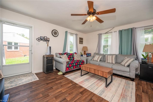 living room with a healthy amount of sunlight and dark hardwood / wood-style floors