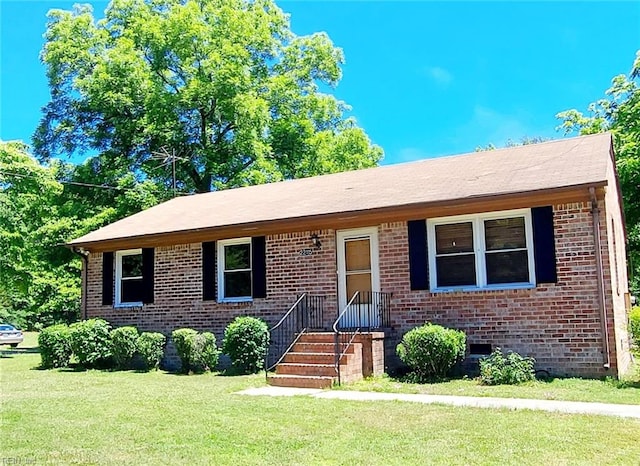 view of front facade with a front yard