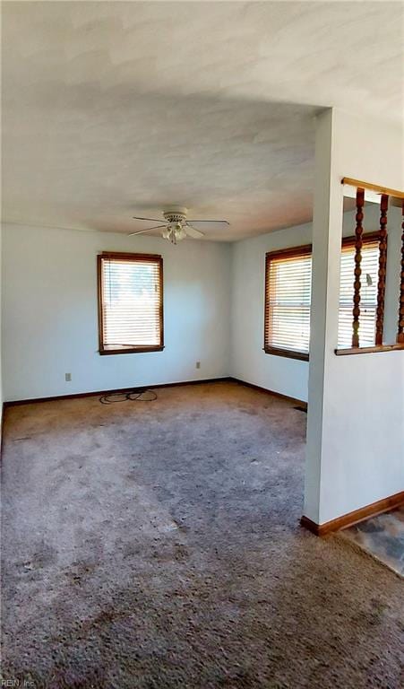 unfurnished room featuring carpet and ceiling fan