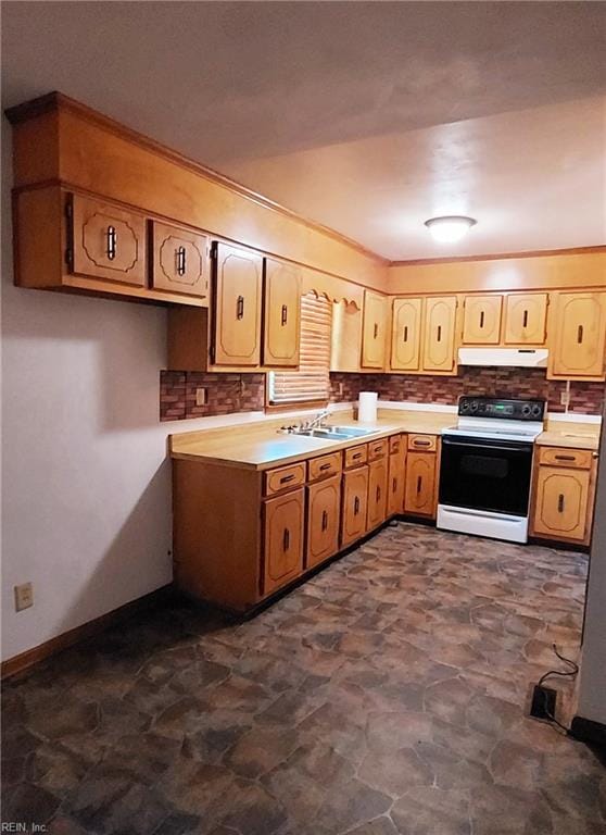 kitchen featuring sink, white range with electric stovetop, and dark tile floors