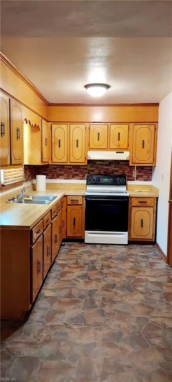 kitchen featuring sink, dark tile flooring, and white range with electric stovetop