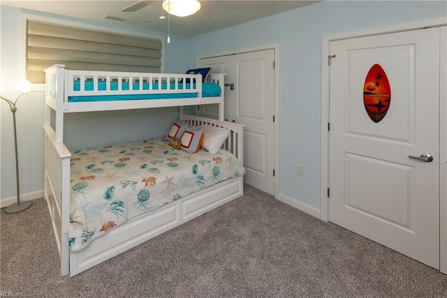 carpeted bedroom featuring ceiling fan