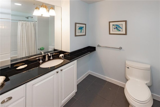 full bathroom with tile flooring, shower / tub combo, vanity, and toilet