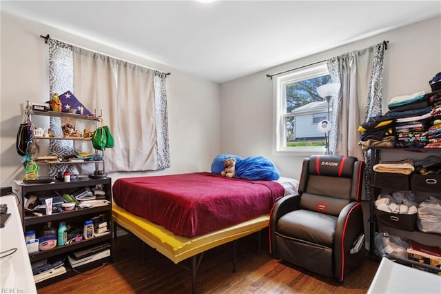 bedroom featuring hardwood / wood-style floors