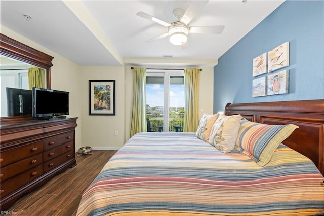 bedroom with ceiling fan and dark wood-type flooring