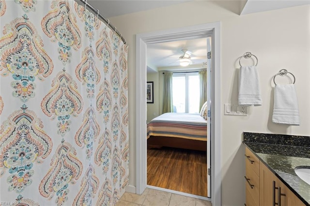 bathroom with vanity, tile patterned floors, and ceiling fan