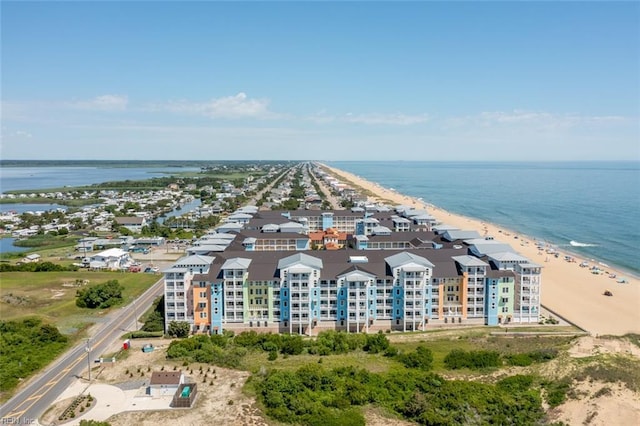 bird's eye view with a beach view and a water view