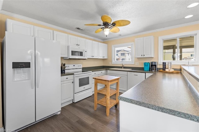 kitchen with white cabinets, ceiling fan, white appliances, and crown molding