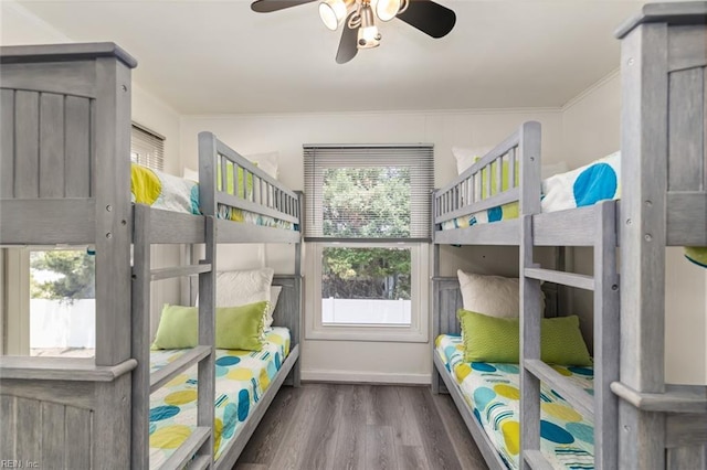 bedroom with hardwood / wood-style flooring and ceiling fan