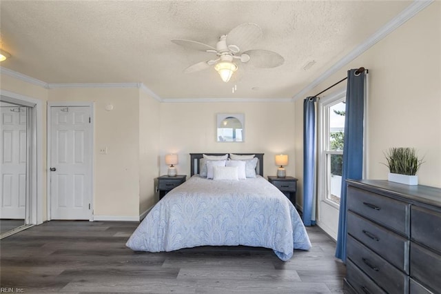 bedroom with ceiling fan, dark hardwood / wood-style flooring, ornamental molding, and a textured ceiling