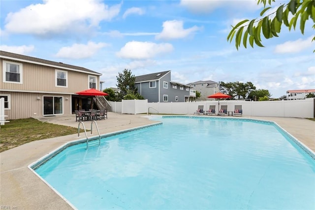 view of pool with a patio