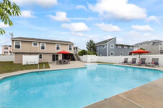 view of pool featuring a patio area