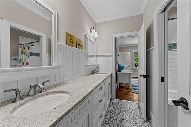 bathroom with tile patterned floors, vanity, and ornamental molding