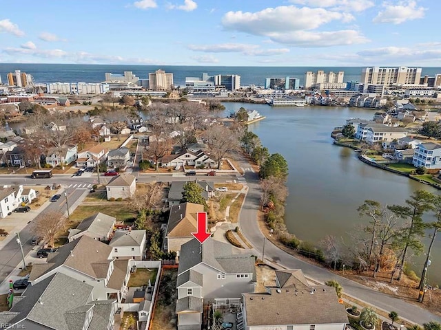 bird's eye view with a water view