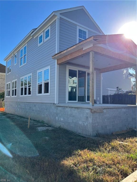 view of home's exterior with a lawn