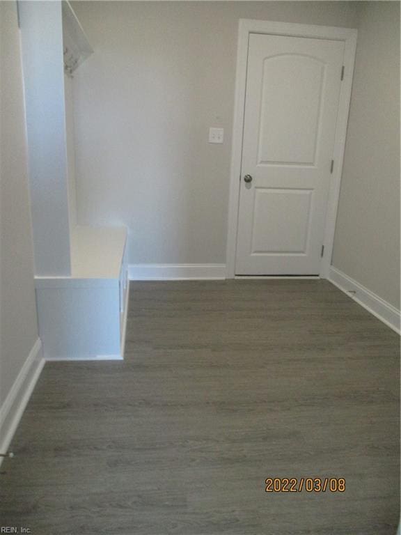 unfurnished room with hardwood / wood-style floors