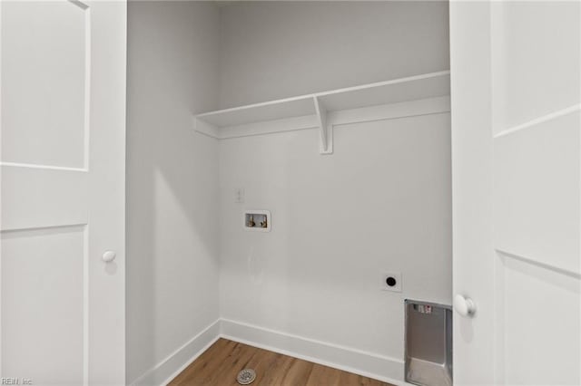 washroom with wood-type flooring, washer hookup, and electric dryer hookup